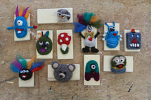 Load image into Gallery viewer, 11 fake wool taxeidermy animal / creatures on a plaque created by teachers at at Pro D day in Burnaby  schools.  Projects range from a bear to a minion like alien, a robot, a mushroom ,an owl and more

